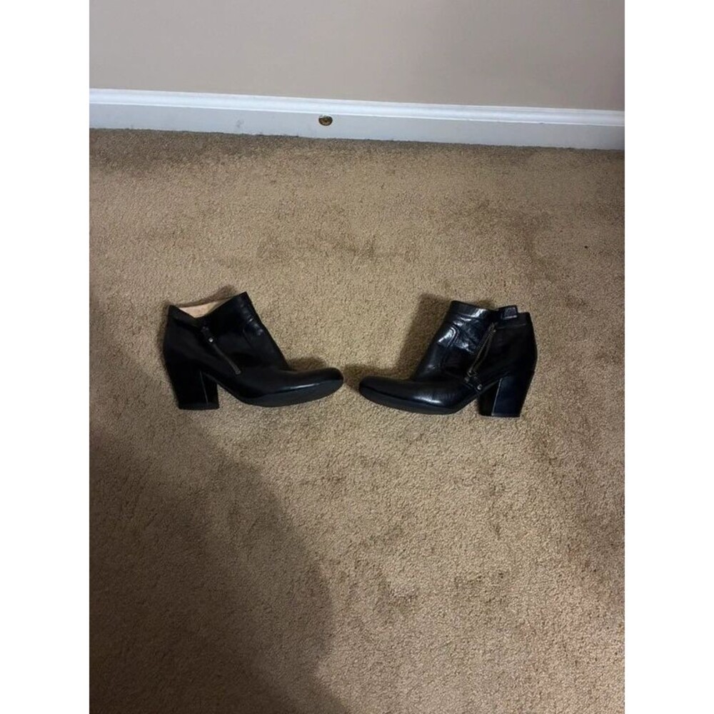 Black leather heeled boots